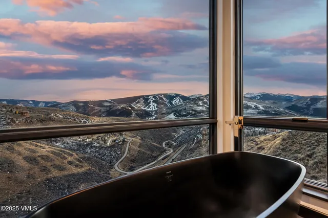 a view of a house with a mountain