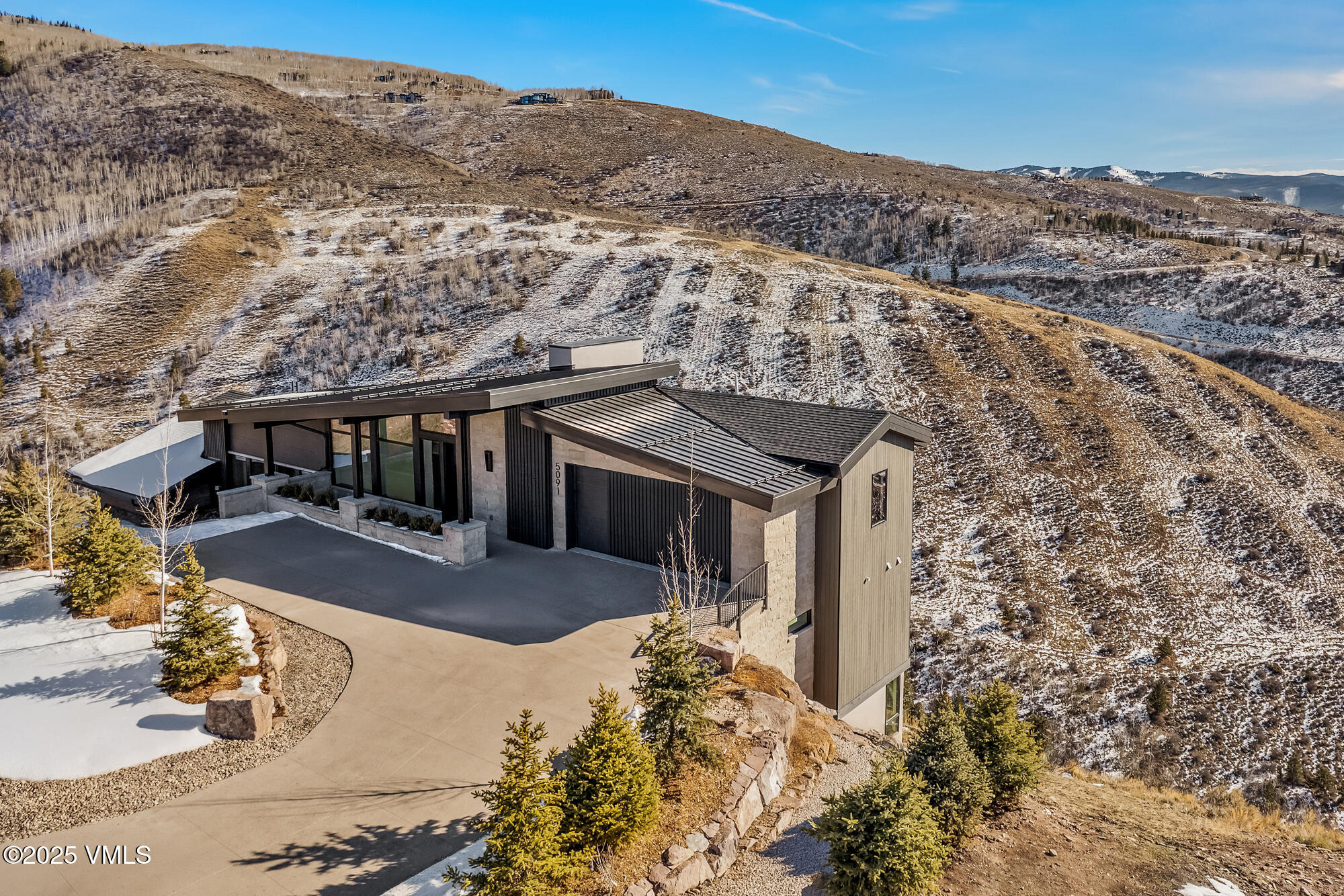5091 Wildridge Road East Avon, CO 81620 - Photo 54 of 68 Winter aerial 2