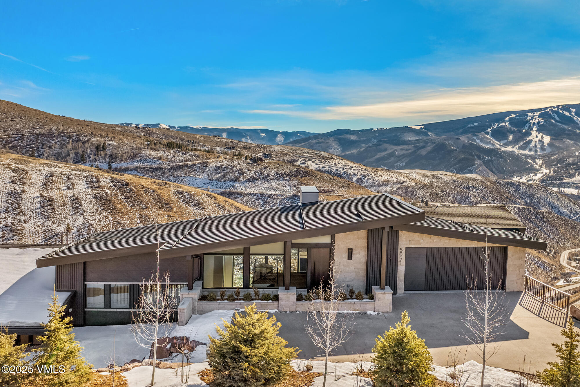 5091 Wildridge Road East Avon, CO 81620 - Photo 55 of 68 Winter aerial 1