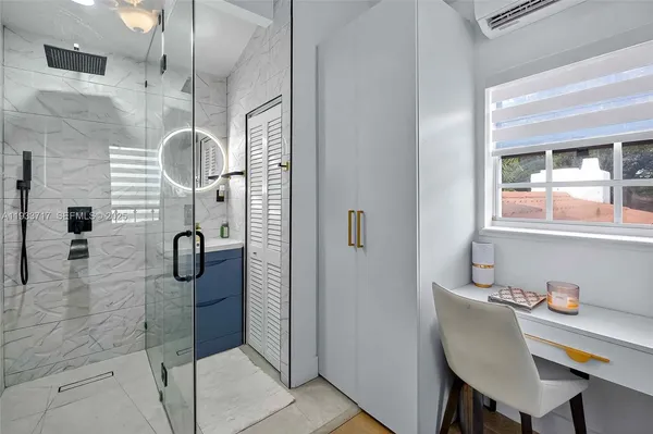 a view of a bedroom with furniture window and a garden