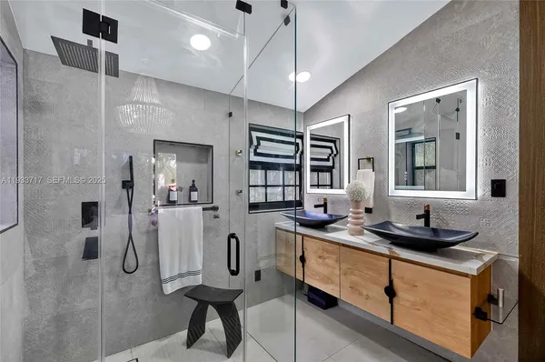 a bedroom with a bed and a desk