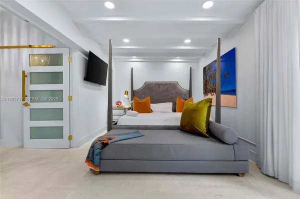 a bathroom with a sink and mirror