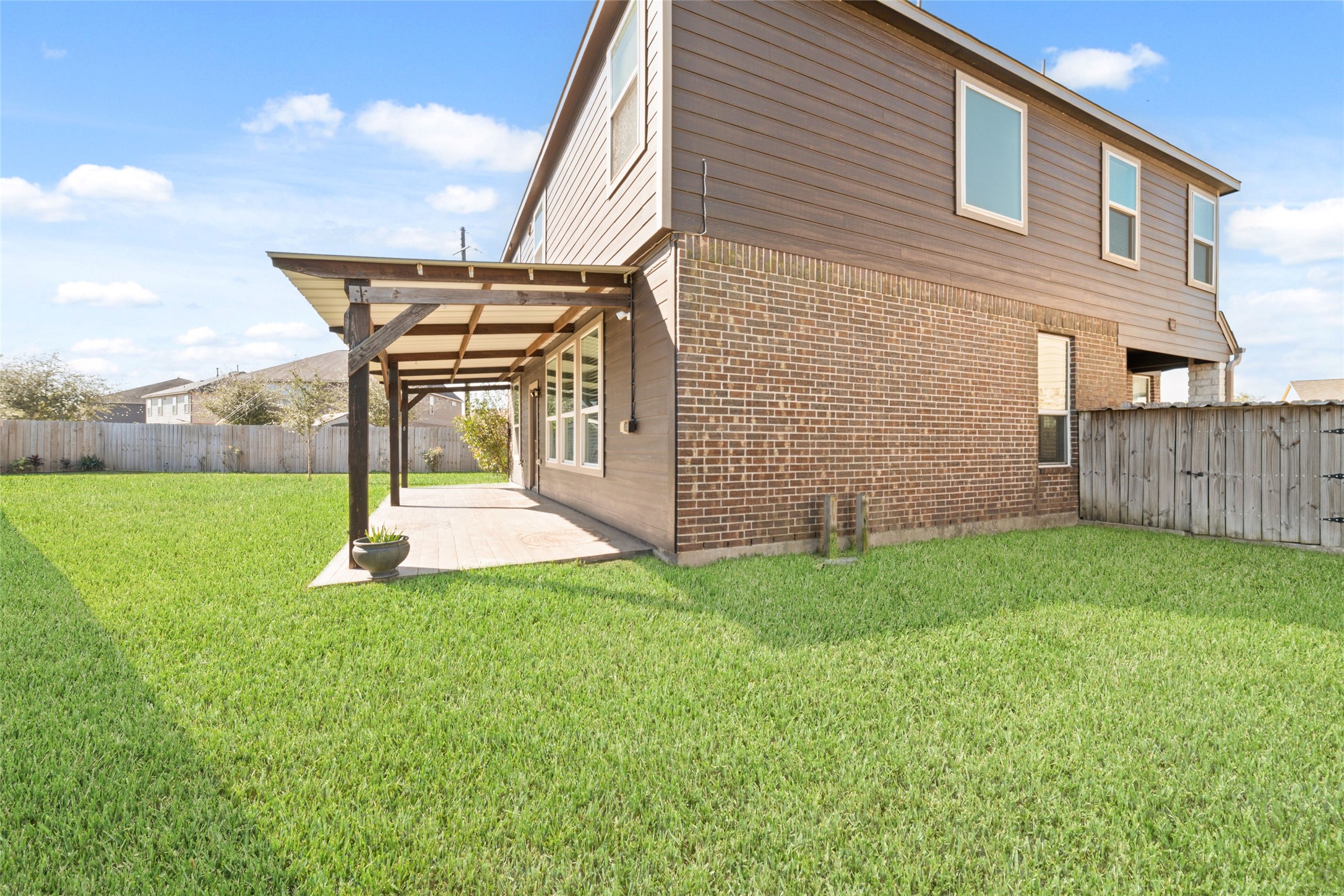14838 Ruddy Duck Lane Houston, TX 77049 - Photo 29 of 33 With no rear neighbors, the spacious backyard offers a more open, private setting that’s well suited for outdoor activities or play!