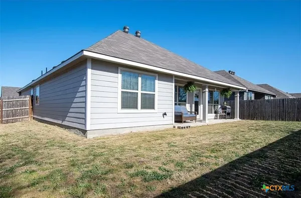 a front view of house with yard