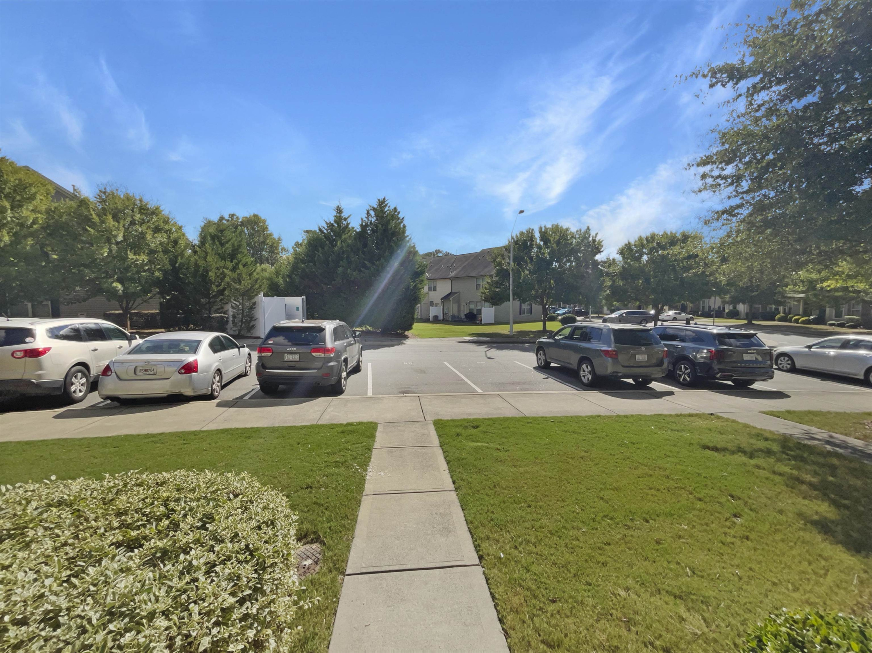 4445 Iyar Way Wake Forest, NC 27587 - Photo 16 of 17 a view of a yard with car parked