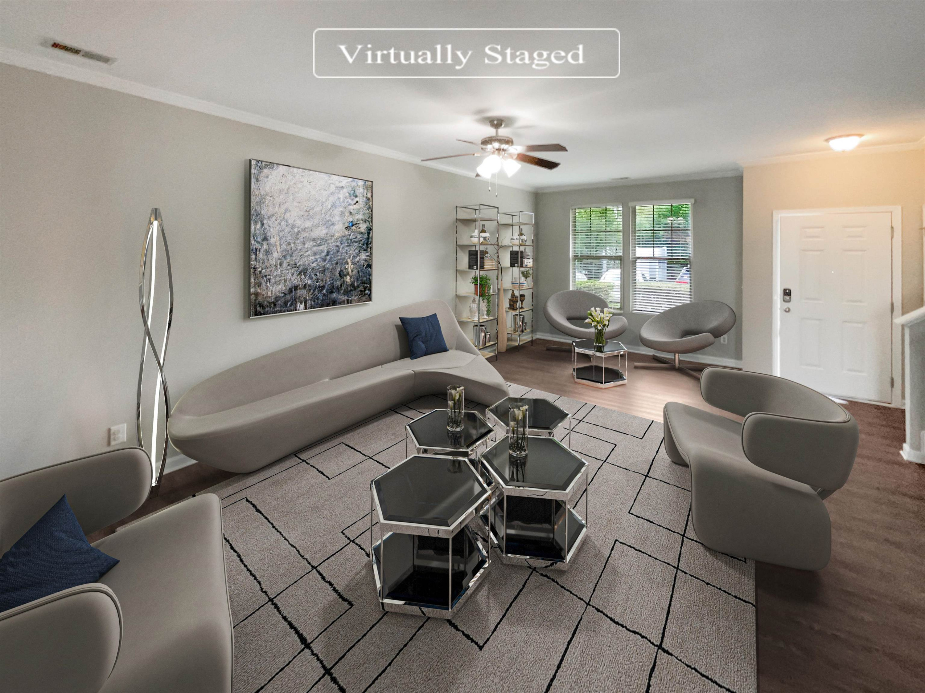 4445 Iyar Way Wake Forest, NC 27587 - Photo 2 of 17 a living room with furniture a chandelier and a window