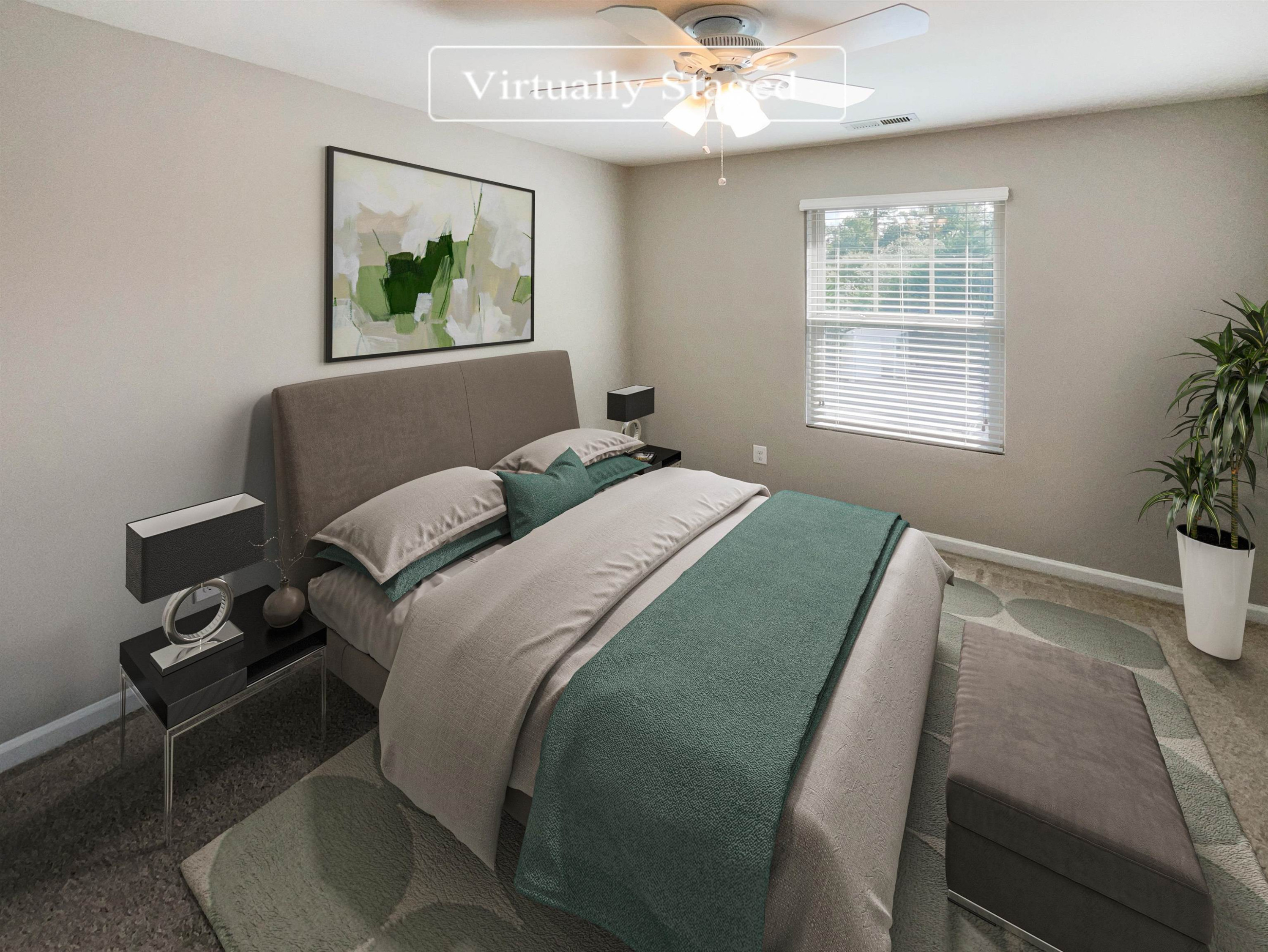 4445 Iyar Way Wake Forest, NC 27587 - Photo 4 of 17 a bedroom with a bed and a window