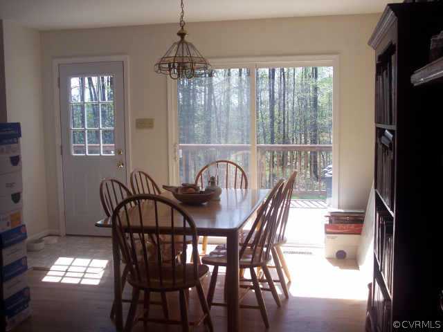 16150 Hopeful Church Road Bumpass, VA 23024 - Photo 4 of 10 a view of a dining room with furniture window and outside view