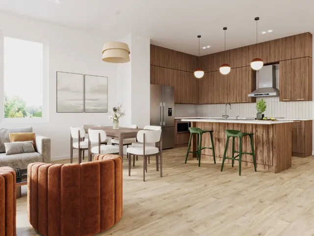 a living room with stainless steel appliances kitchen island granite countertop furniture and a large window
