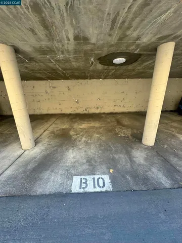 a view of car parked in front of house