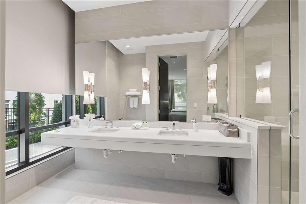 2520 Peachtree Road, Unit 603 Atlanta, GA 30305 - Photo 63 of 91 a bathroom with a sink and a mirror