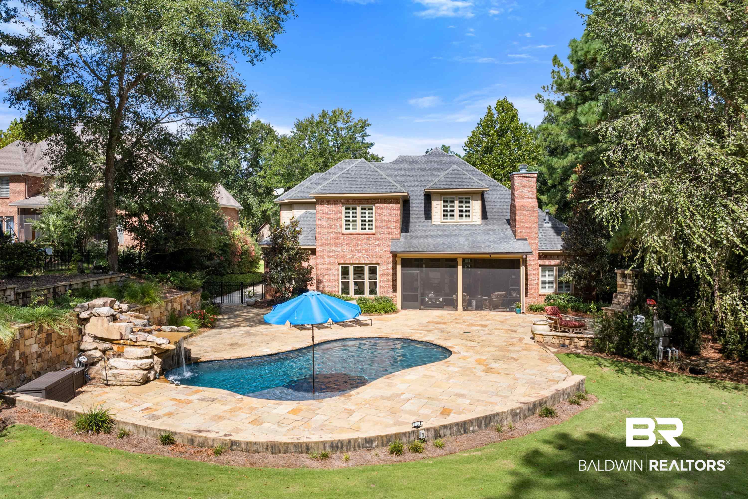 30057 Dolive Ridge Daphne, AL 36527 - Photo 42 of 55 View of swimming pool featuring a patio, a lawn, a sunroom, and pool water feature