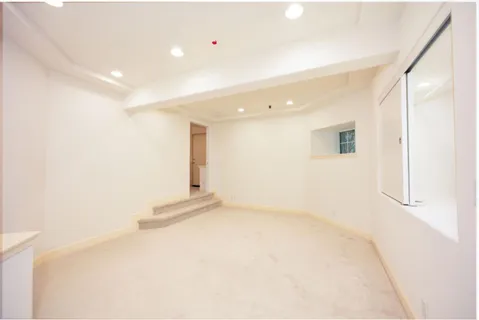 a kitchen with a sink stove and refrigerator
