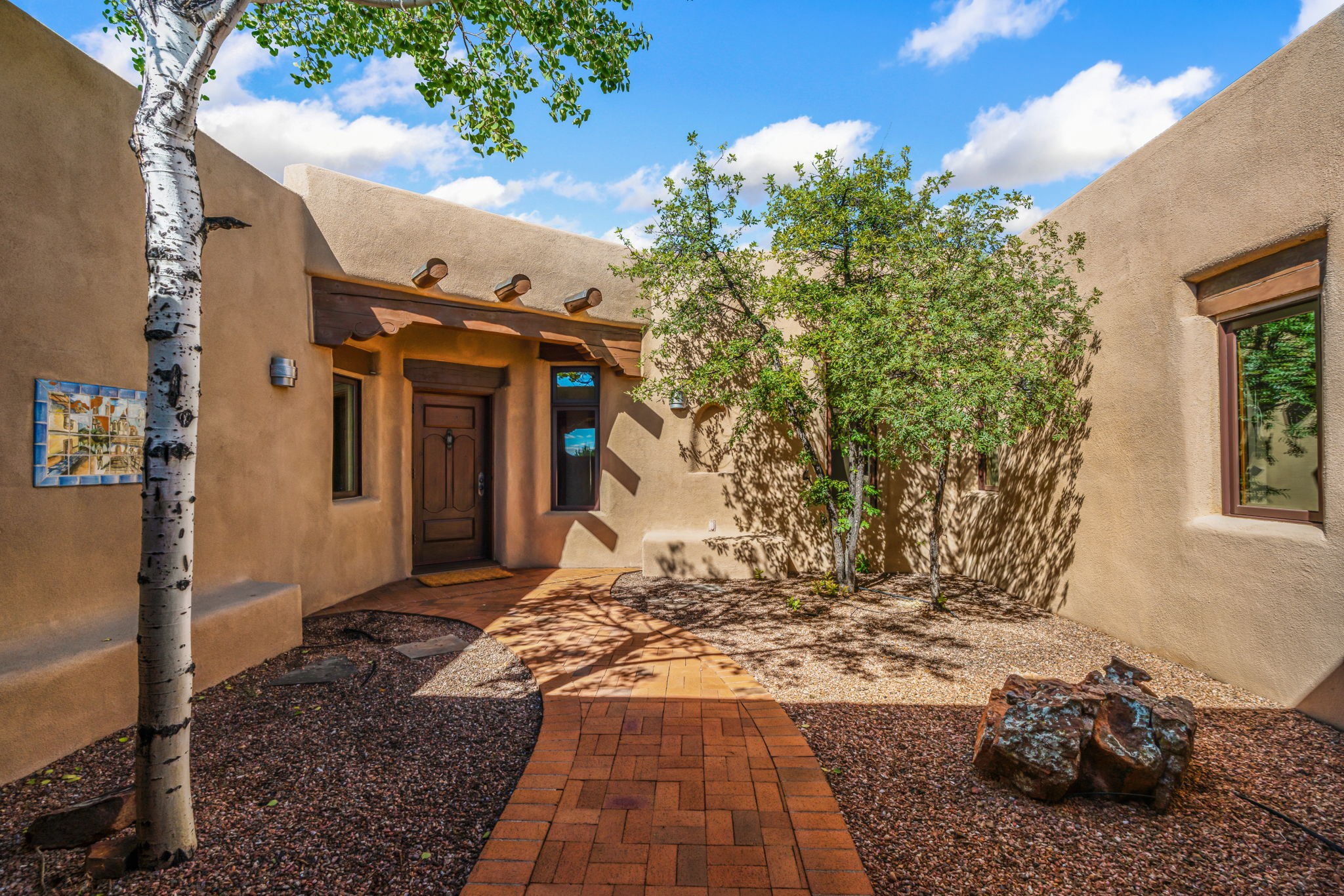 10 Antigua Road Santa Fe, NM 87508 - Photo 3 of 57 Front brick walkway to front door