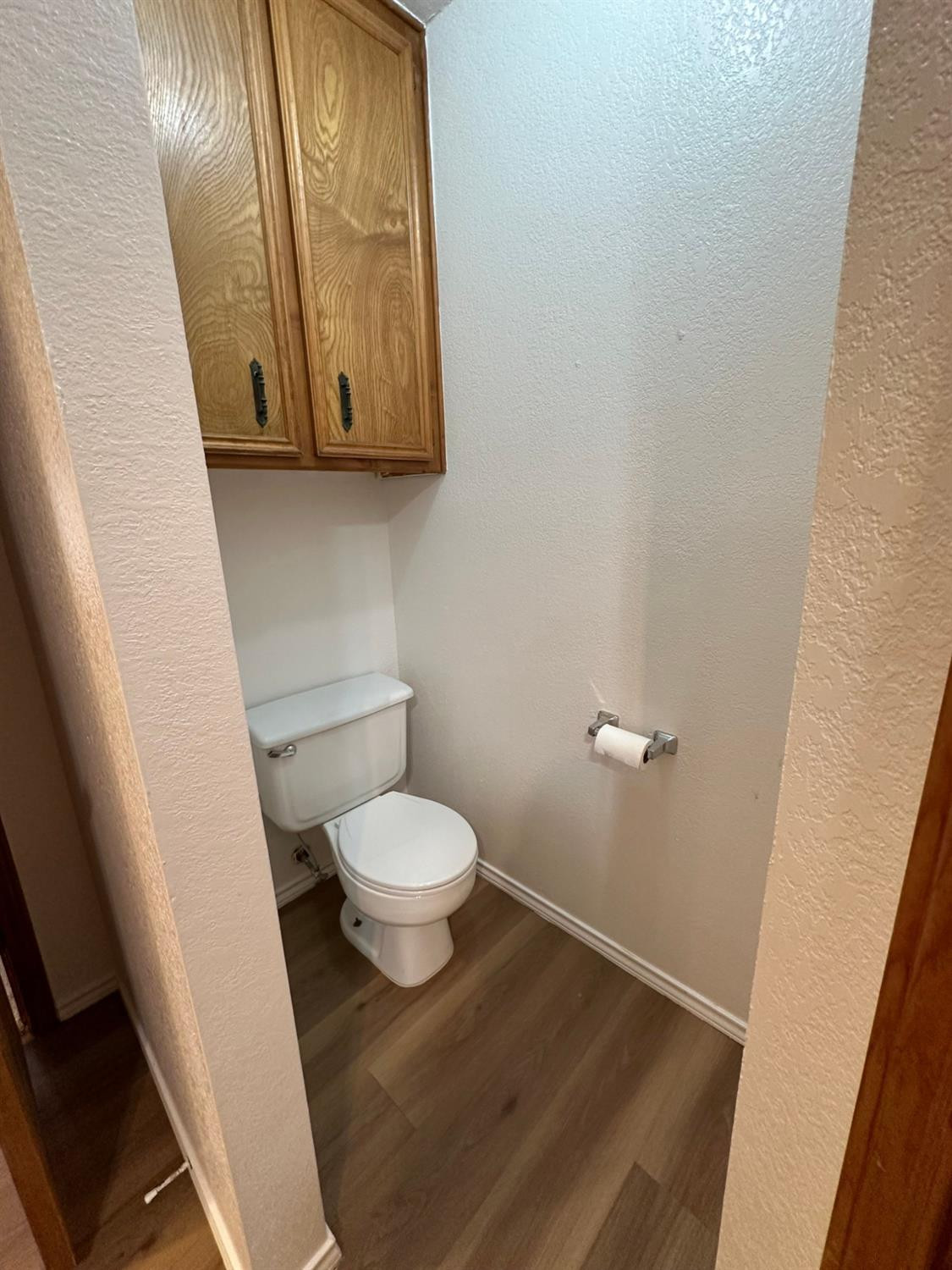 5609 88th Street Lubbock, TX 79424 - Photo 12 of 21 a bathroom with a toilet and a sink