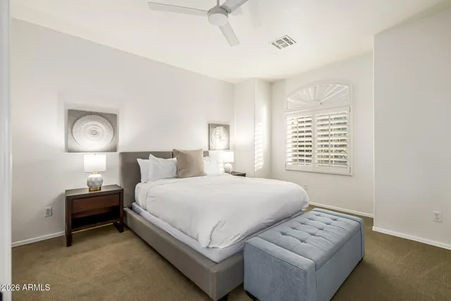 a bathroom with a sink and a mirror with toilet