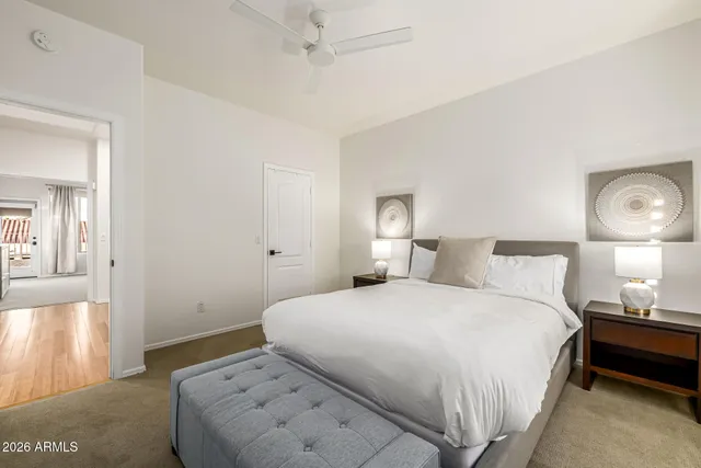 a view of a kitchen with stove and wooden floor