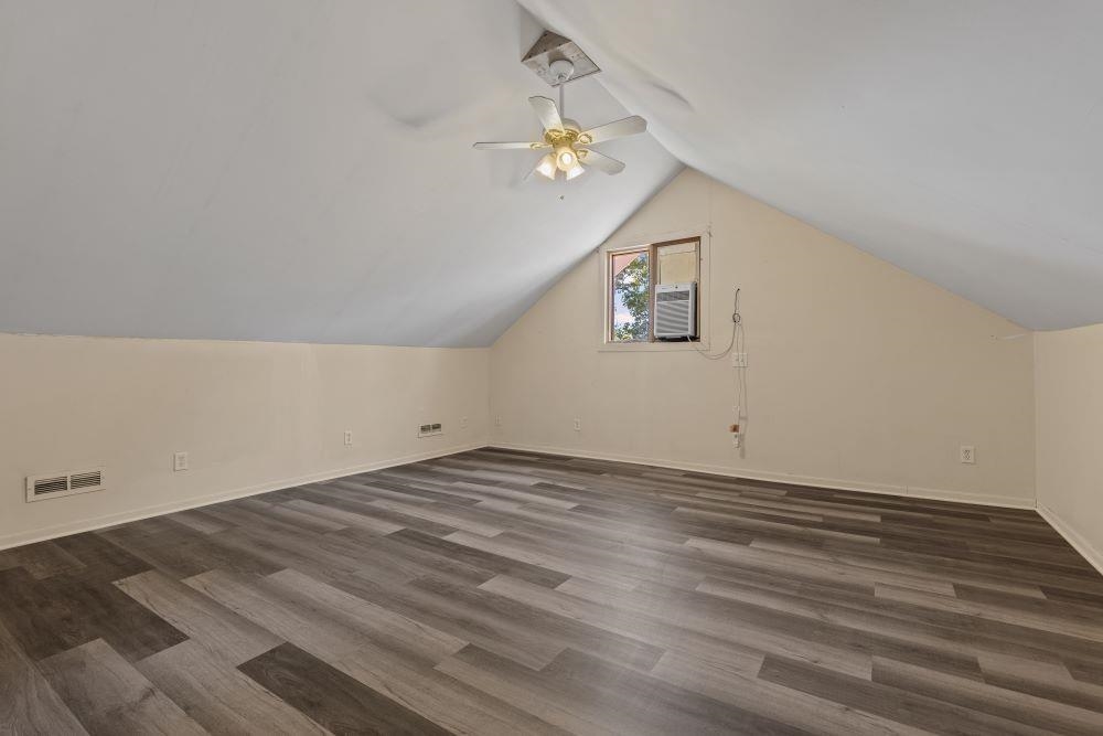 5987 Prairie Road Rockford, IL 61102 - Photo 12 of 21 a view of a room with wooden floor