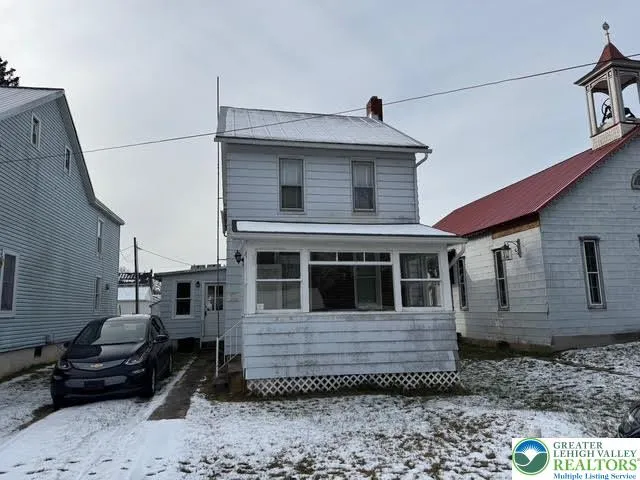 a view of a house with a patio