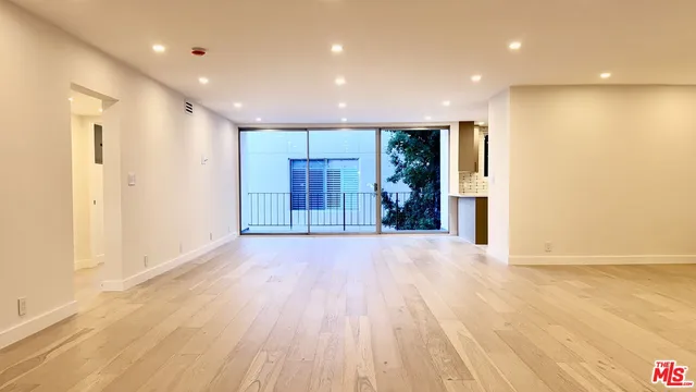 a view of livingroom with wooden floor