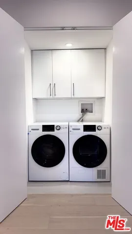 a kitchen with a stove and cabinets