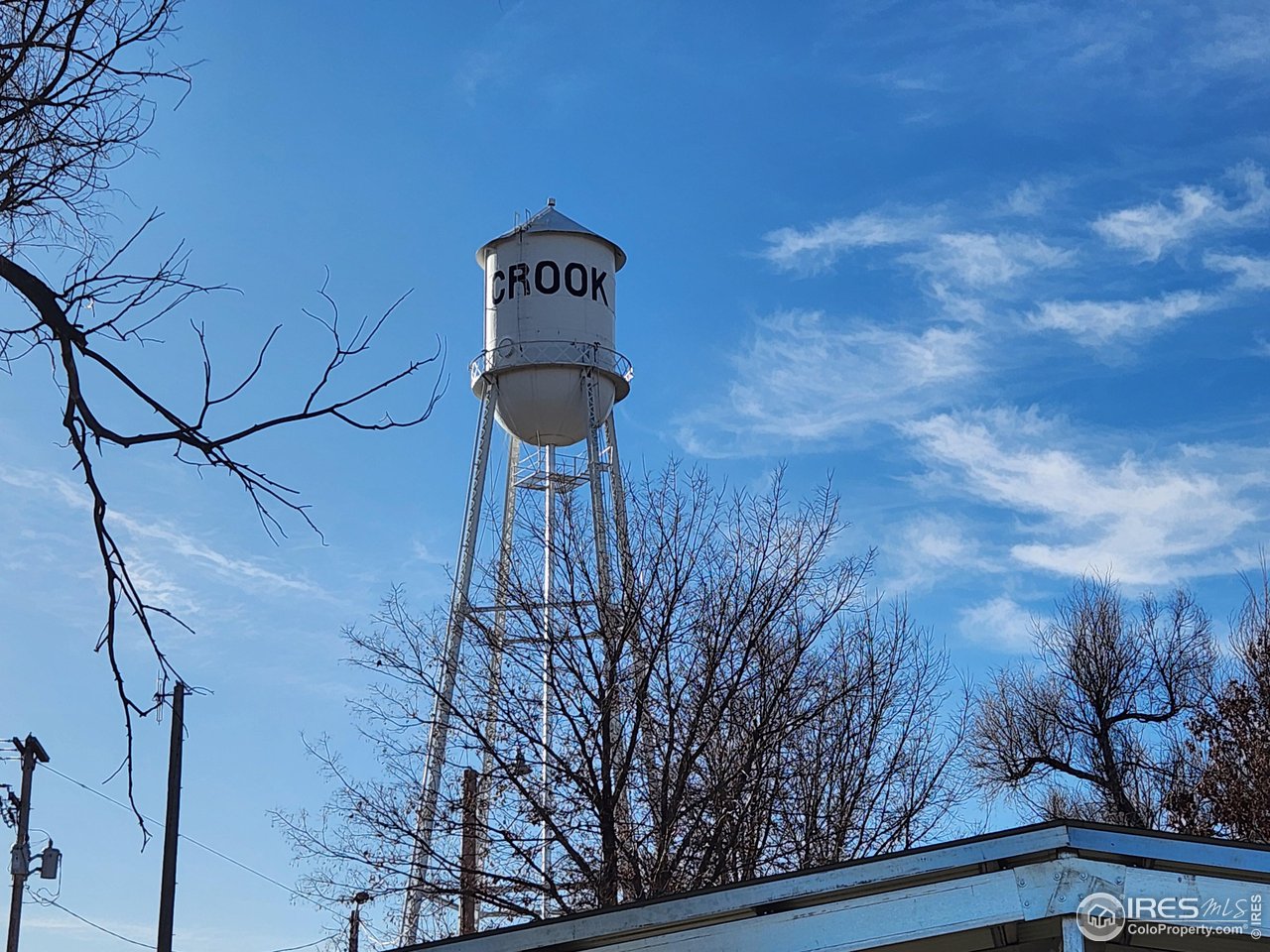 3rd Street Crook, CO 80726 - Photo 11 of 12 a view of a tree with wooden fence
