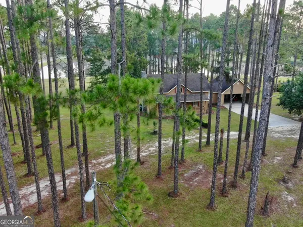 a view of yard with swimming pool