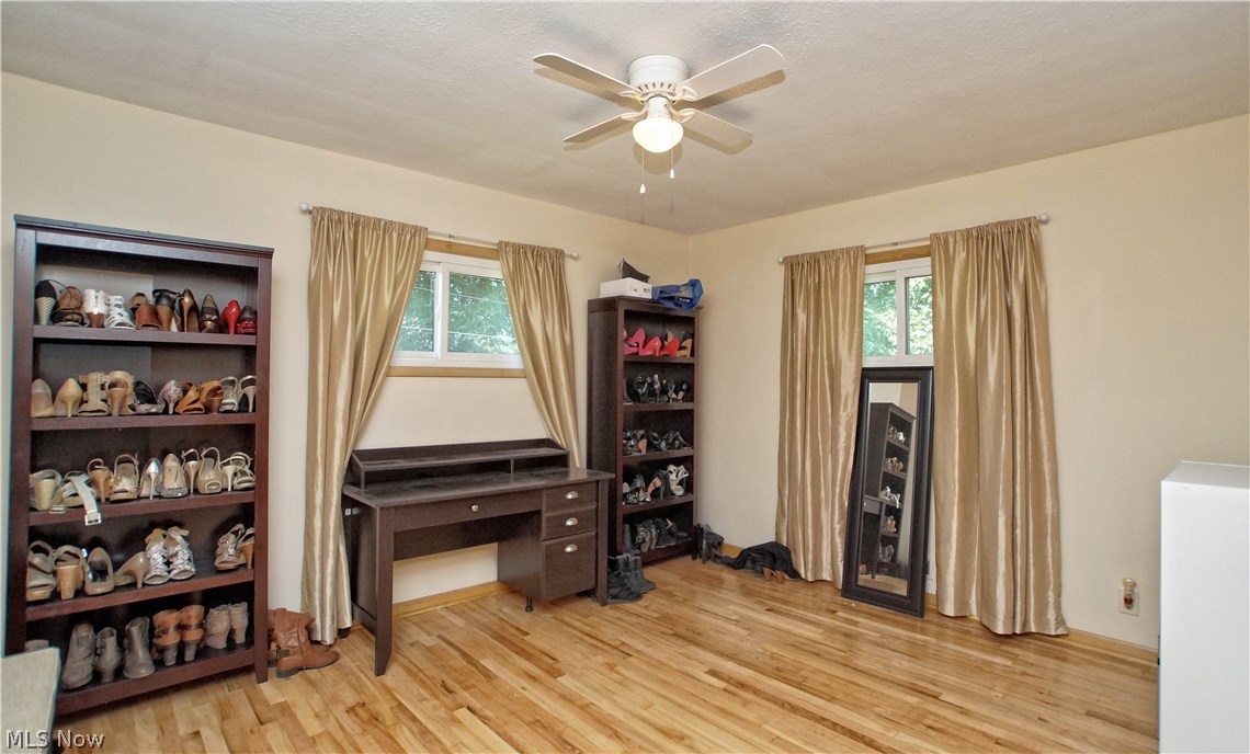 8601 Royal Ridge Drive Parma, OH 44129 - Photo 21 of 33 Bedroom 3 with hardwood floors and lighted ceiling light.