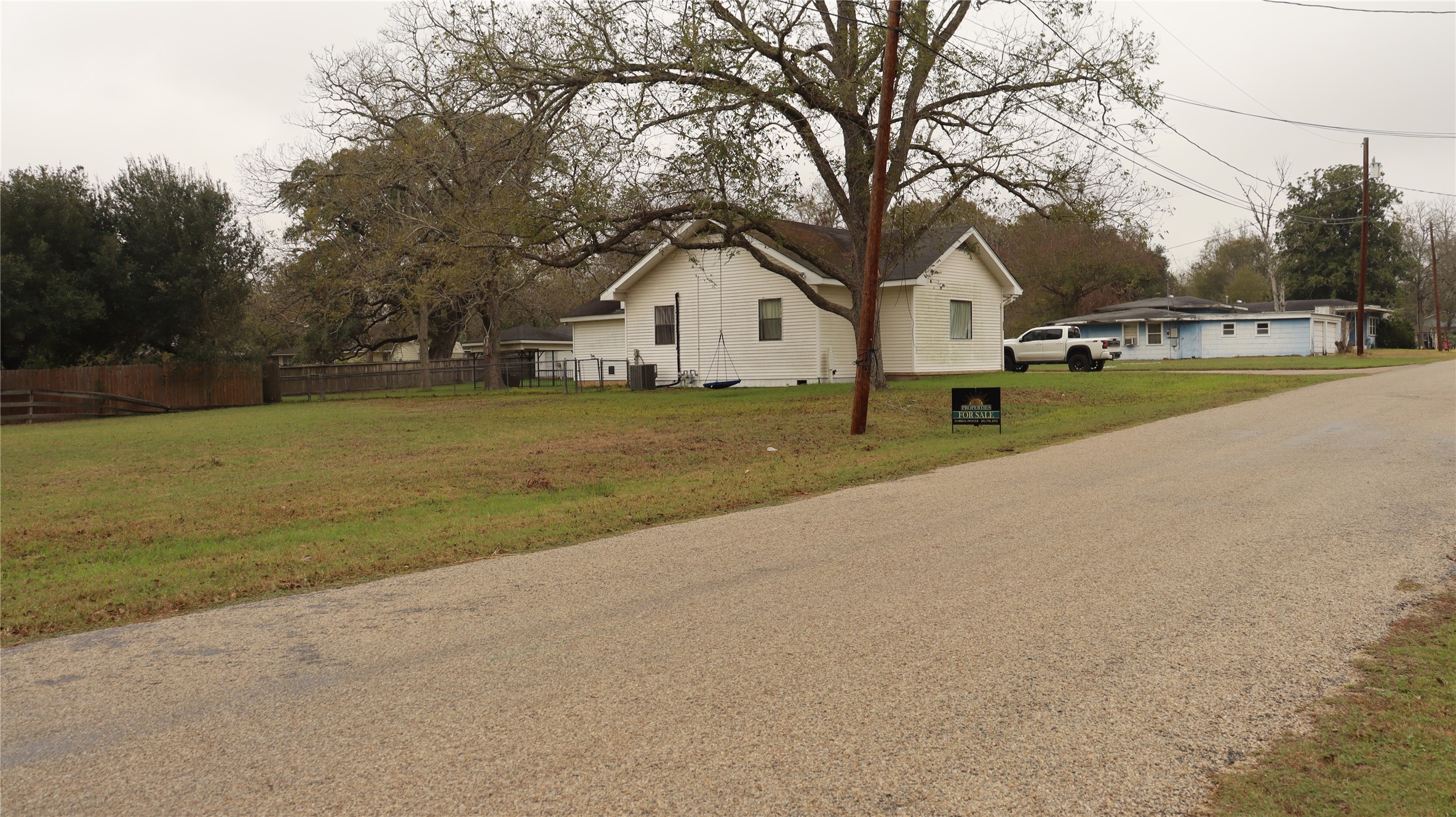 Tbd Charter Street Columbus, TX 78934 - Photo 5 of 7 a house with trees in the background