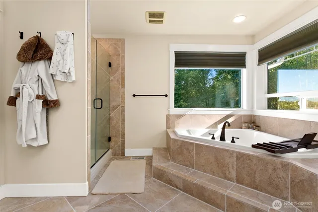 a living room with a couch and a large window