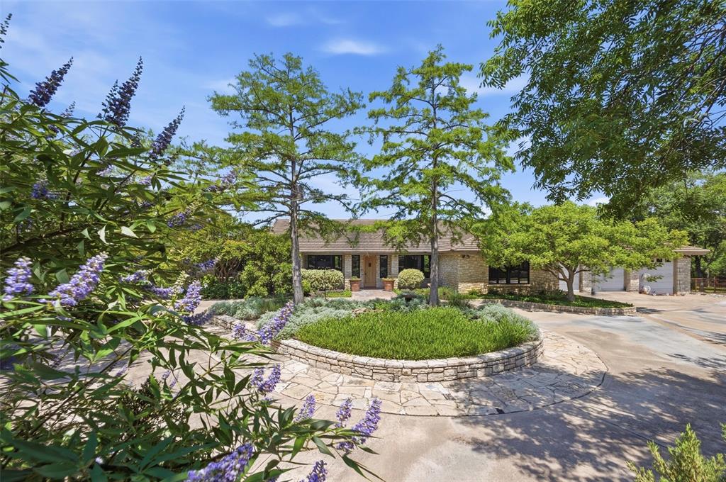 201 Jenkins Ridge Aledo, TX 76008 - Photo 4 of 39 a view of a fountain in the backyard of house