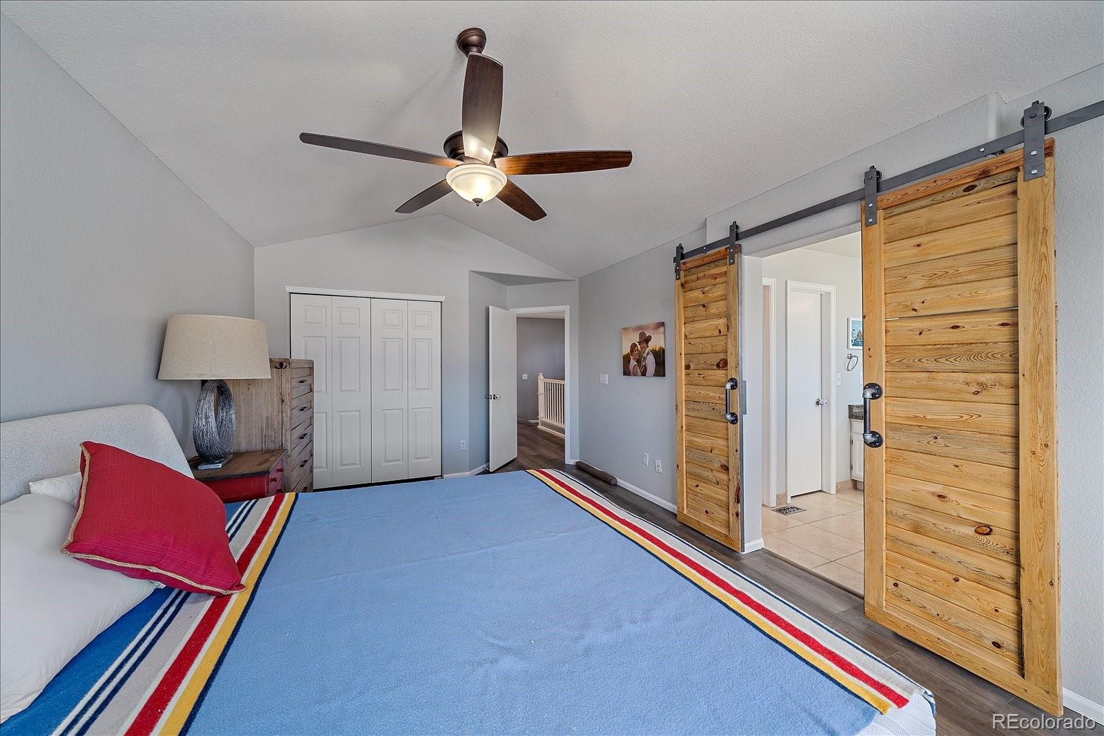 722 Calgary Way Golden, CO 80401 - Photo 25 of 50 a living room with furniture and wooden floor