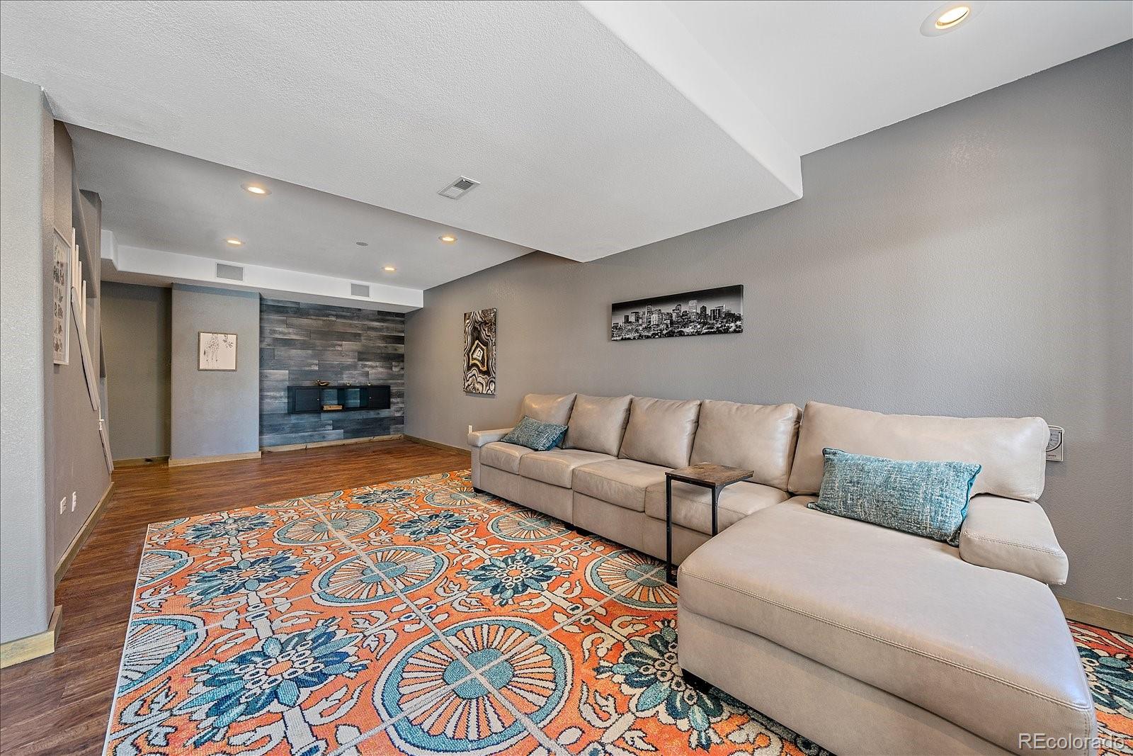 722 Calgary Way Golden, CO 80401 - Photo 32 of 50 a living room with furniture and a rug