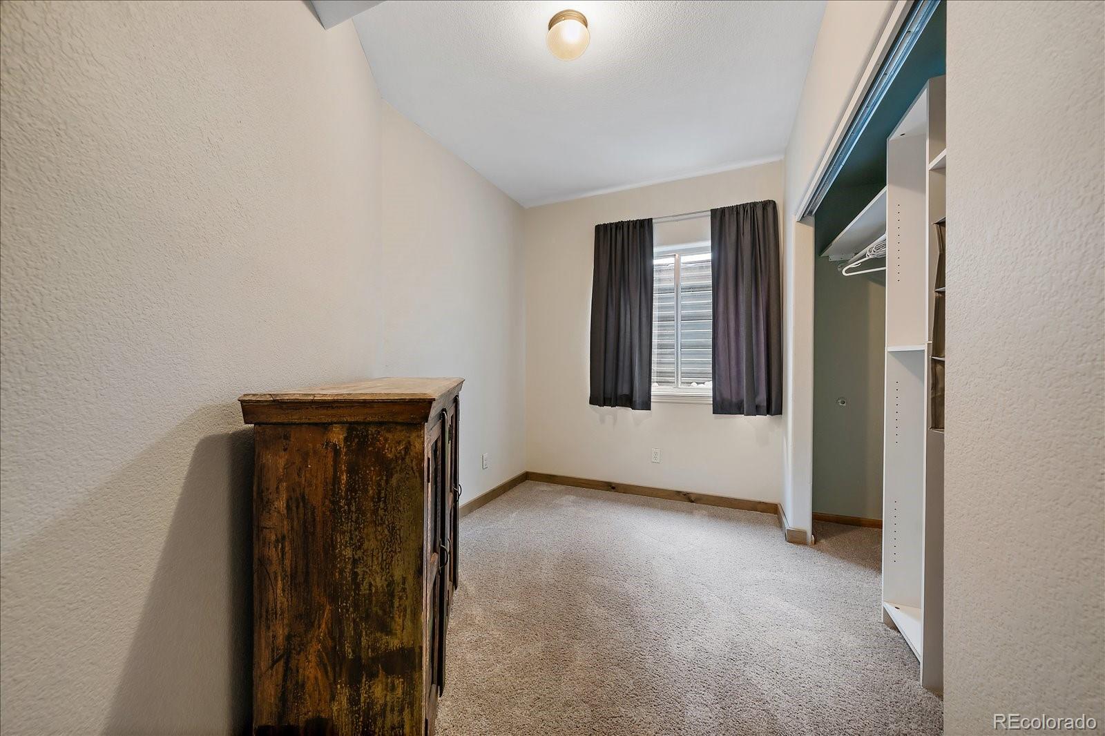 722 Calgary Way Golden, CO 80401 - Photo 39 of 50 a view of an empty room with window