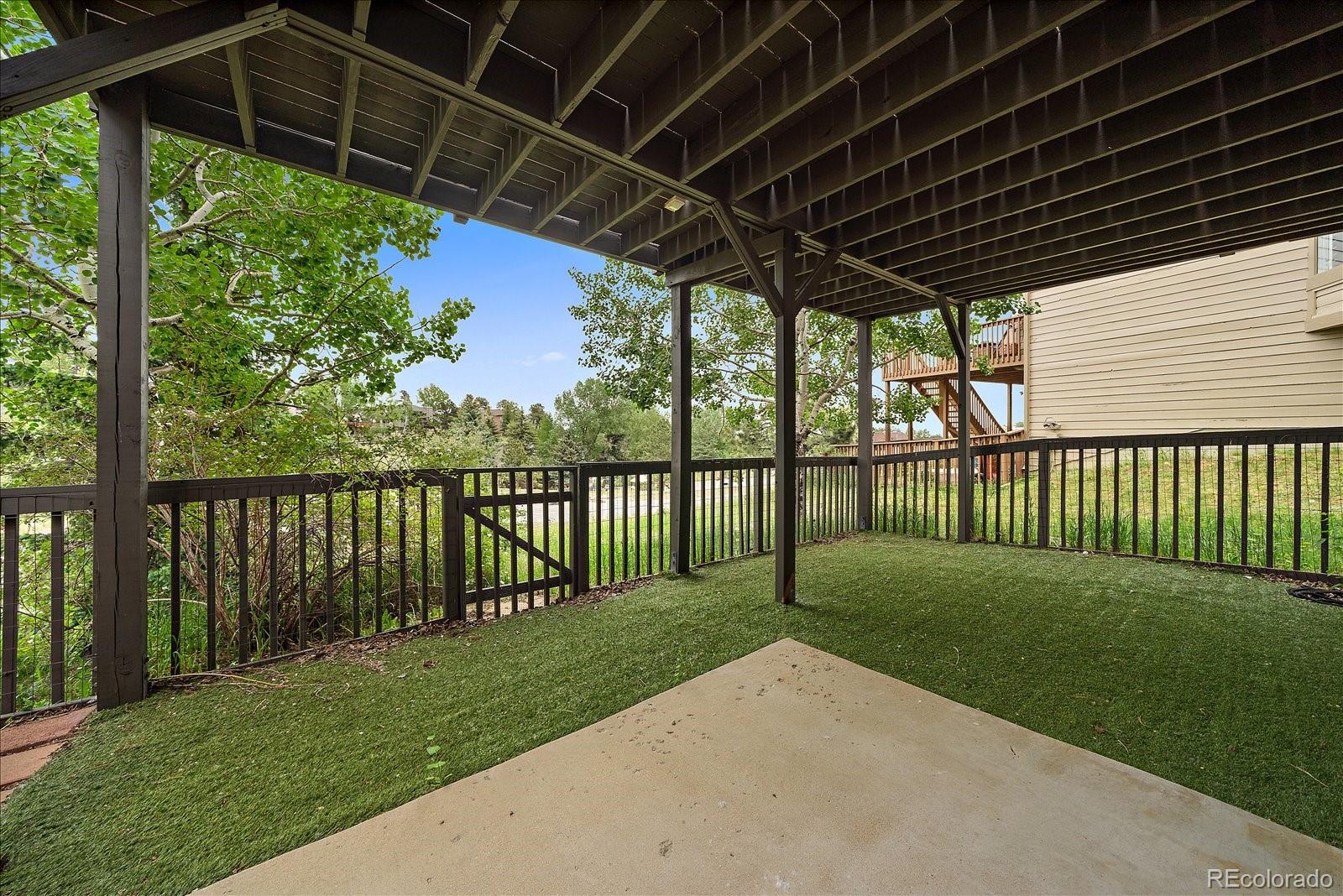 722 Calgary Way Golden, CO 80401 - Photo 44 of 50 a view of a backyard with a garden