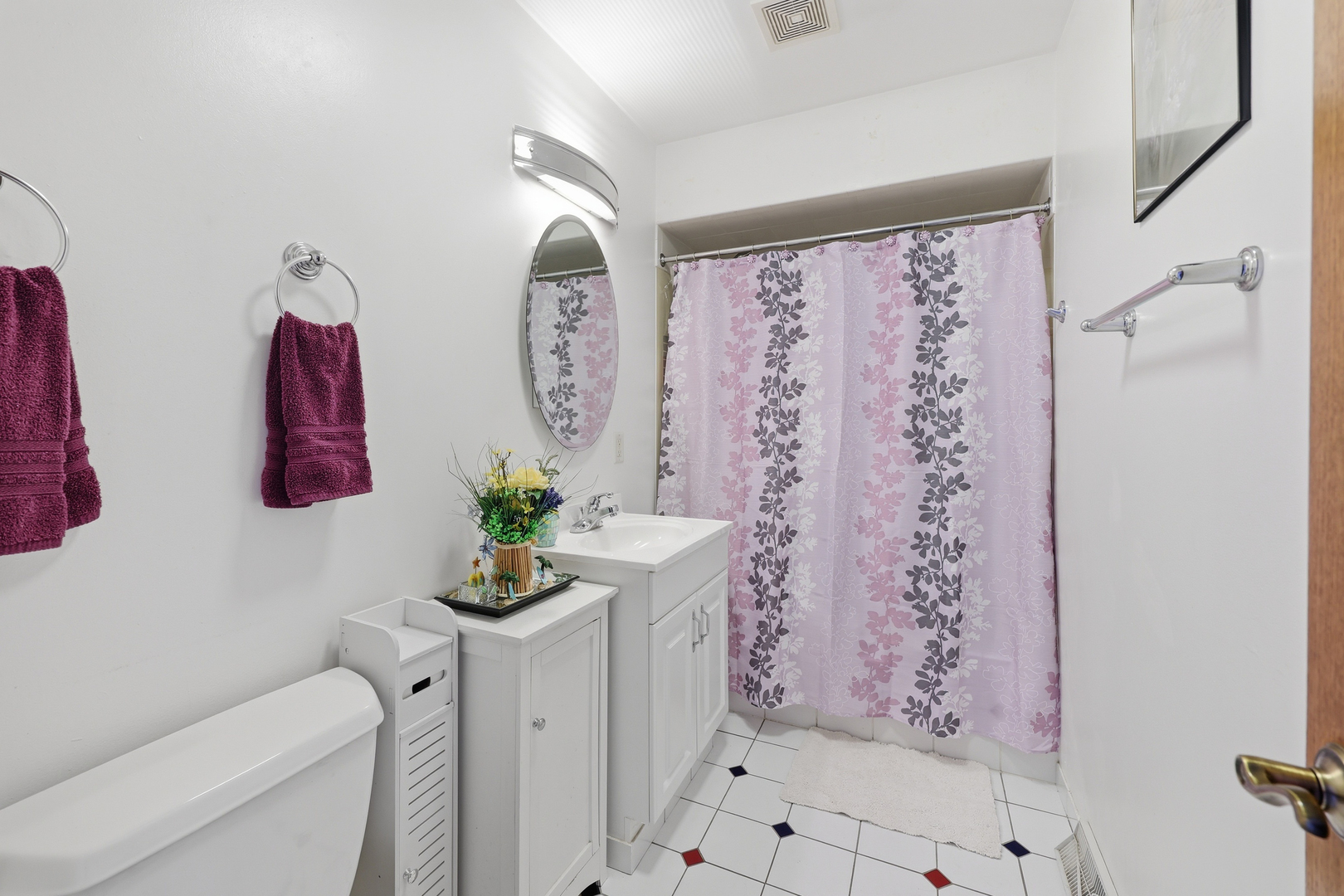 329 East Myrick Avenue Addison, IL 60101 - Photo 12 of 30 a bathroom with a shower a toilet and sink