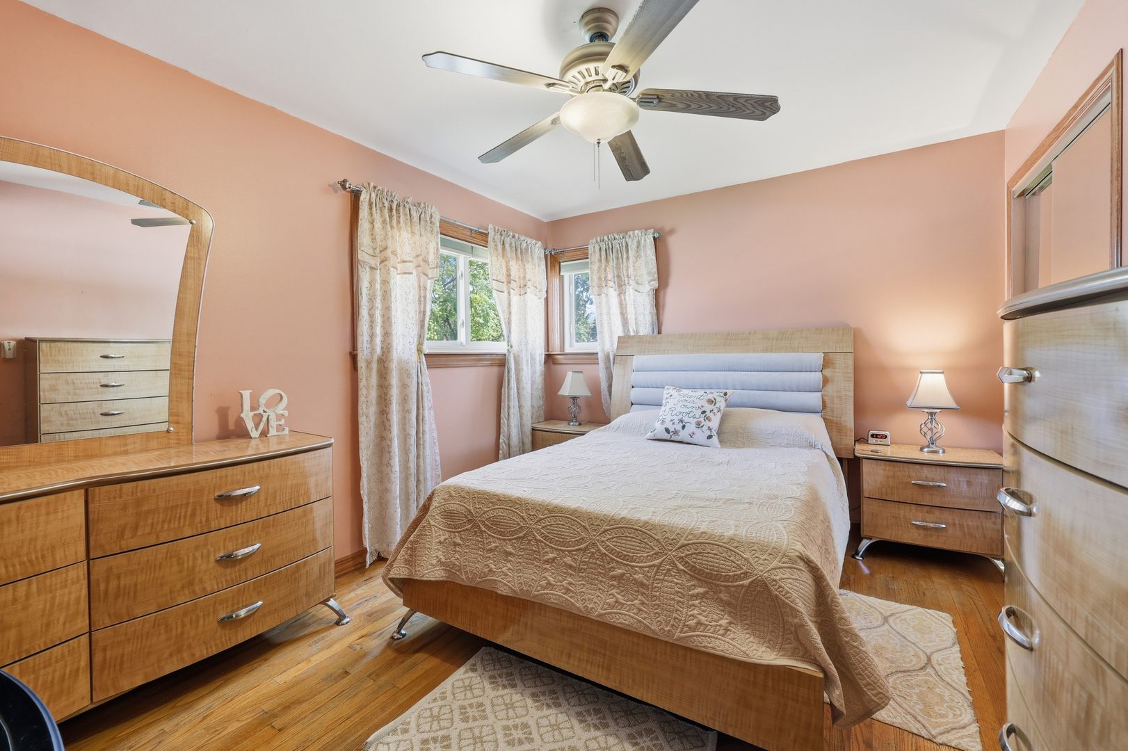 329 East Myrick Avenue Addison, IL 60101 - Photo 13 of 30 a bedroom with a bed and a chandelier