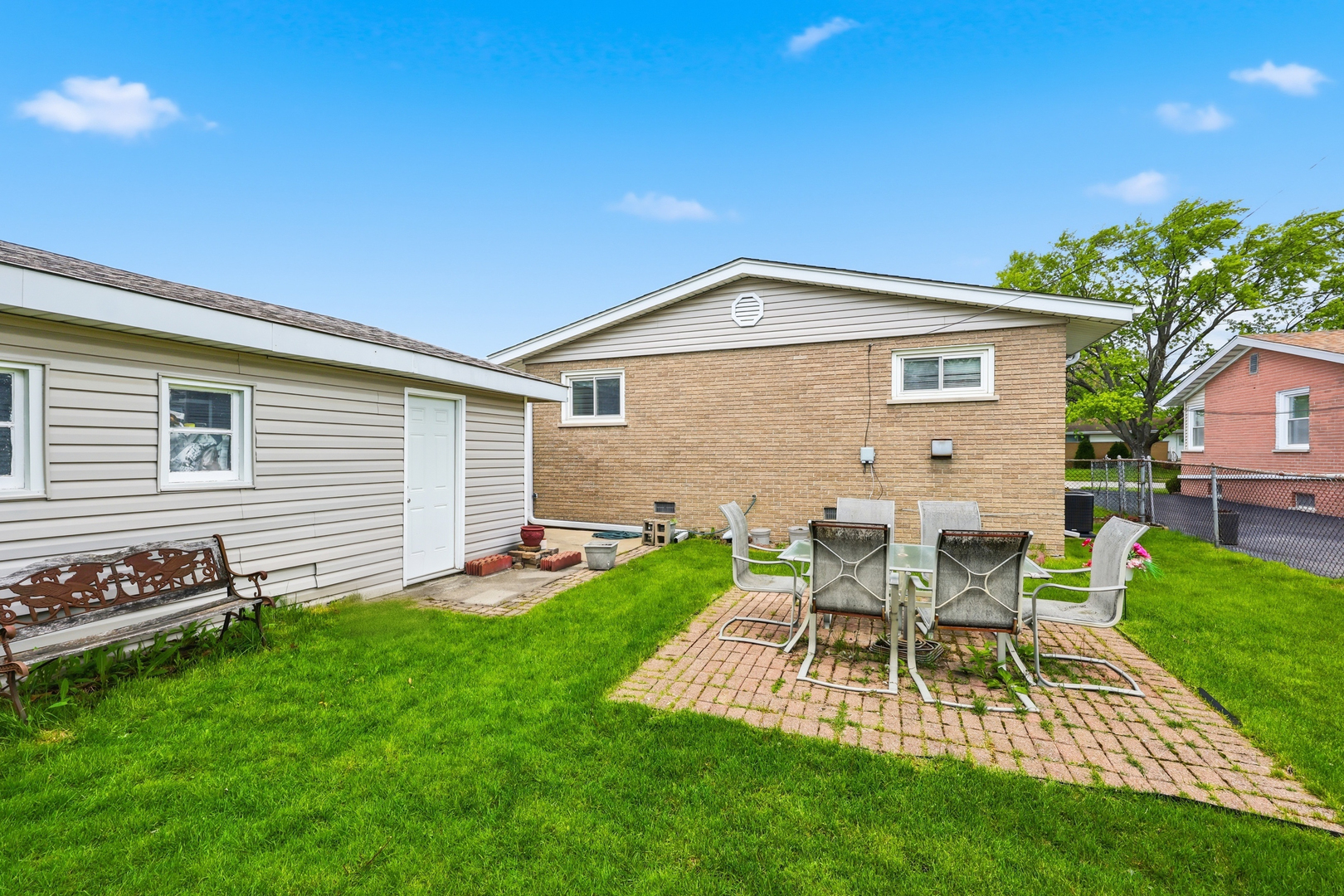 329 East Myrick Avenue Addison, IL 60101 - Photo 24 of 30 a view of a house with a backyard