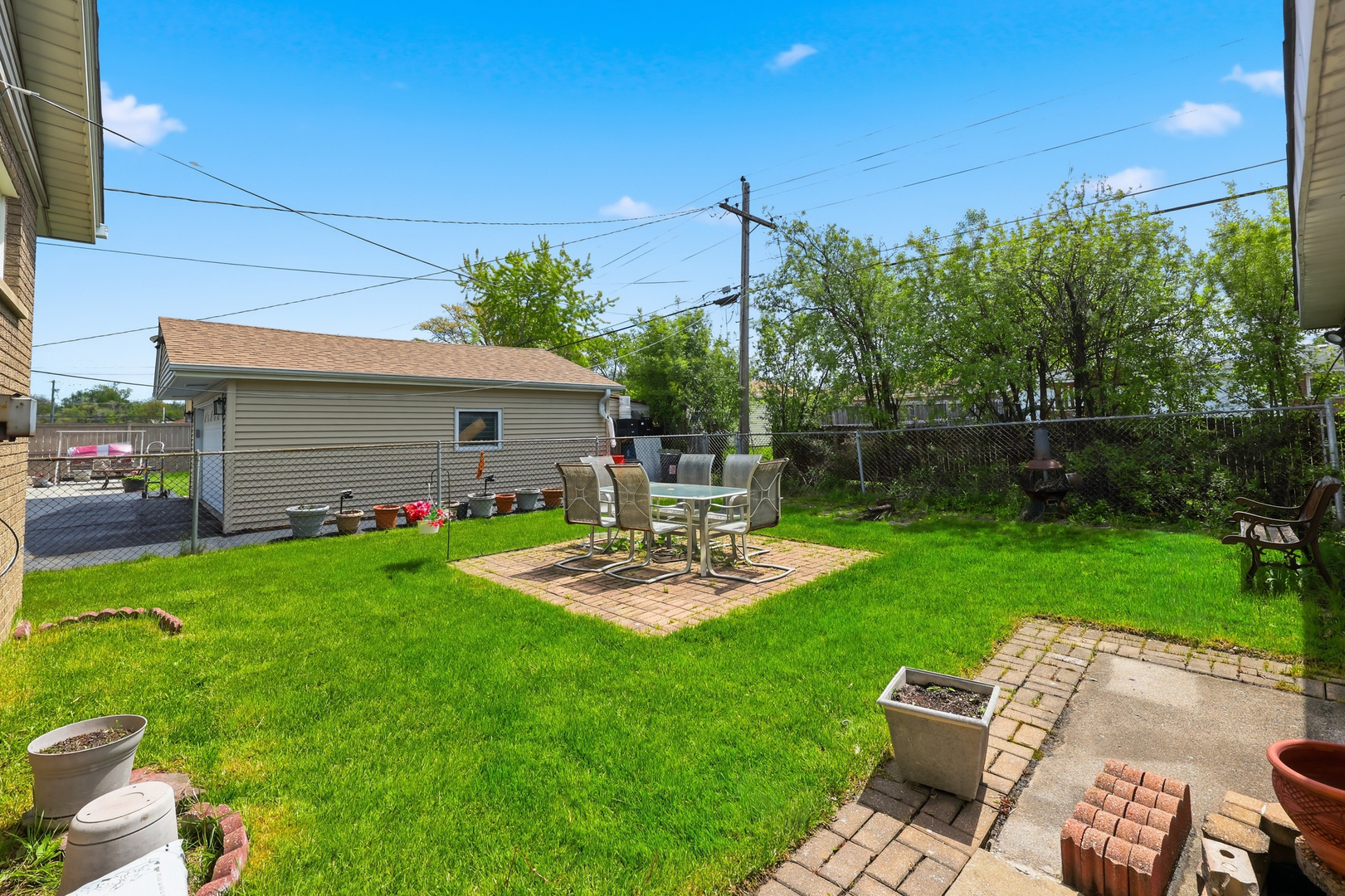 329 East Myrick Avenue Addison, IL 60101 - Photo 25 of 30 a view of backyard with seating area and green space