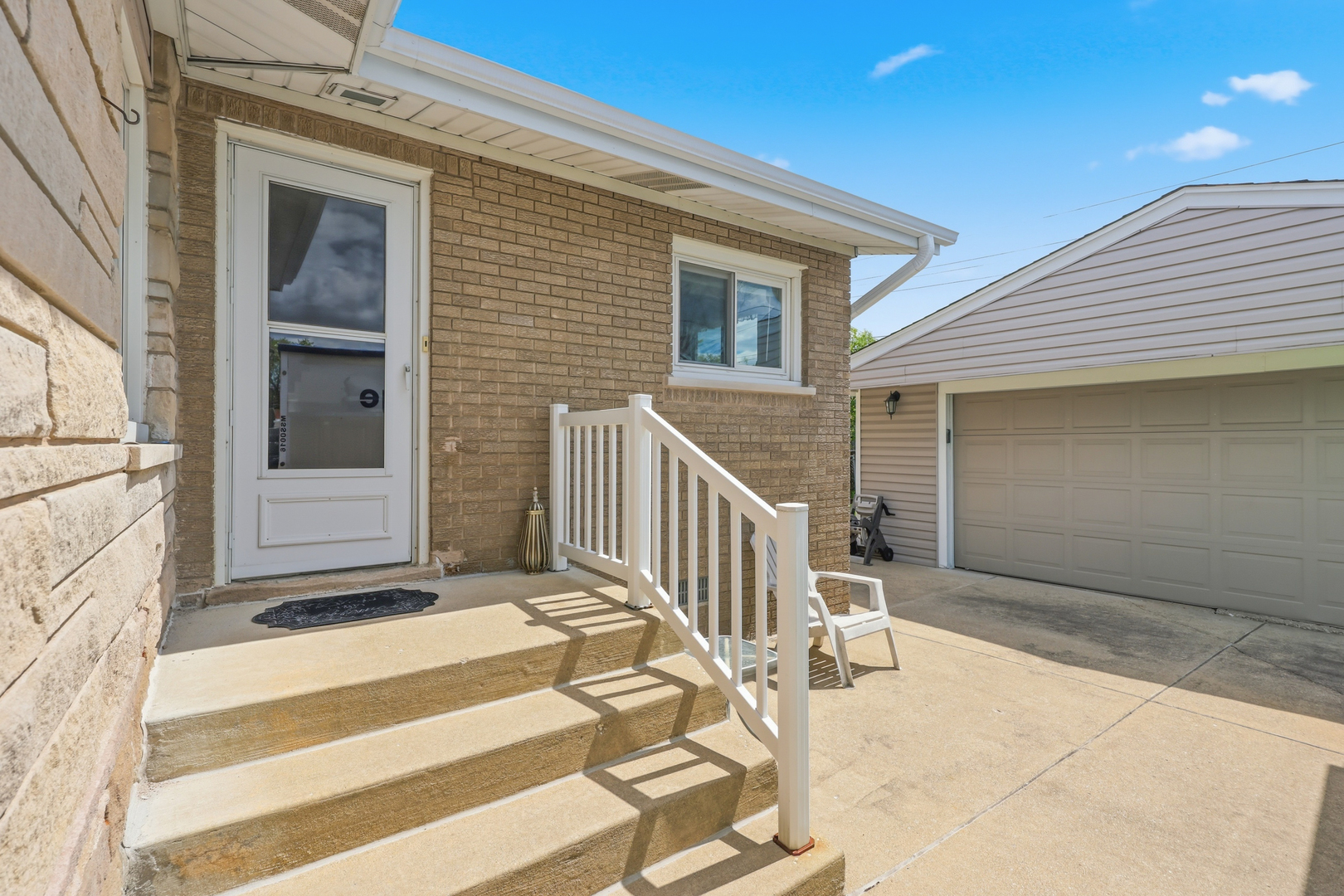 329 East Myrick Avenue Addison, IL 60101 - Photo 26 of 30 a view of front door of house with stairs