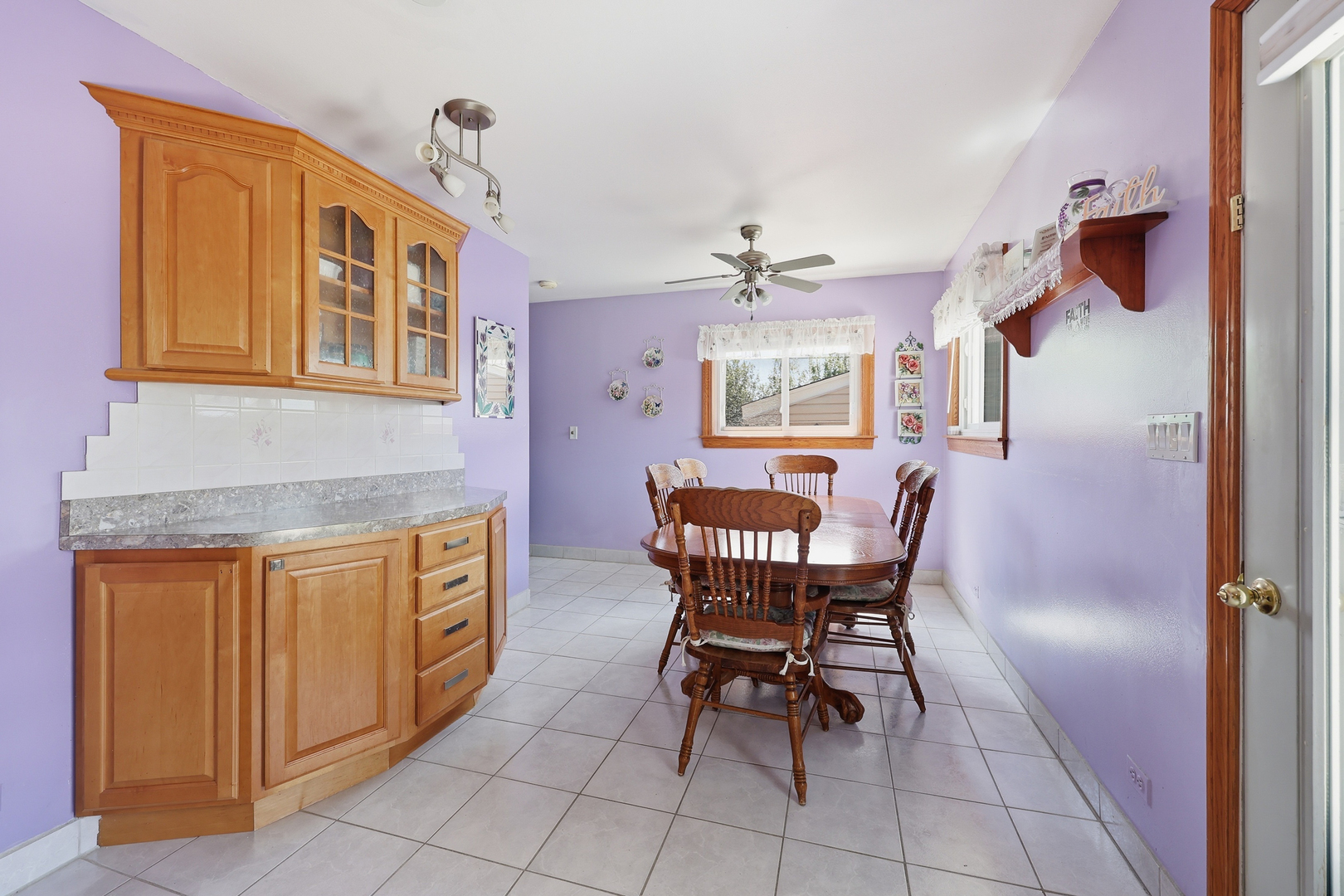 329 East Myrick Avenue Addison, IL 60101 - Photo 8 of 30 a dining room with furniture and window