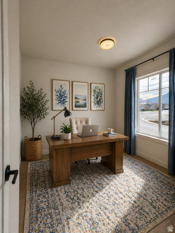 1142 West 220 North Mapleton, UT 84664 - Photo 10 of 26 Virtually Staged Dedicated office space featuring wood-finish flooring, a large window with white trim, and a semi-flush mount ceiling light fixture