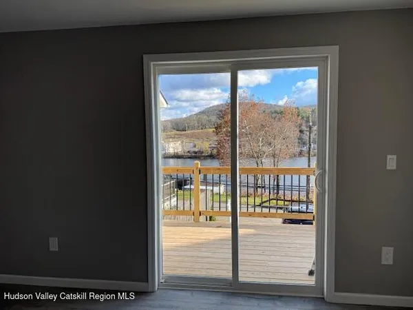 a view of a living room with furniture