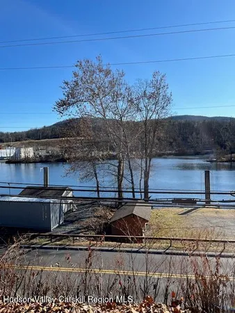 a view of a pathway with a bench