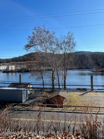 a view of a pathway with a bench
