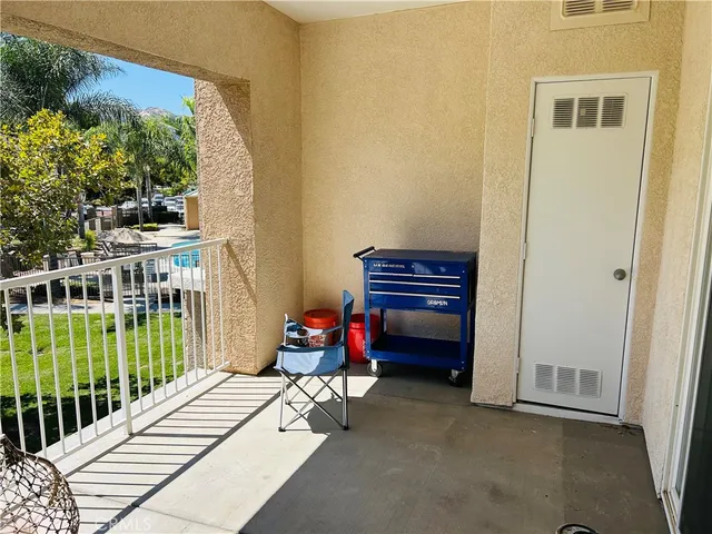 a room with furniture and a window