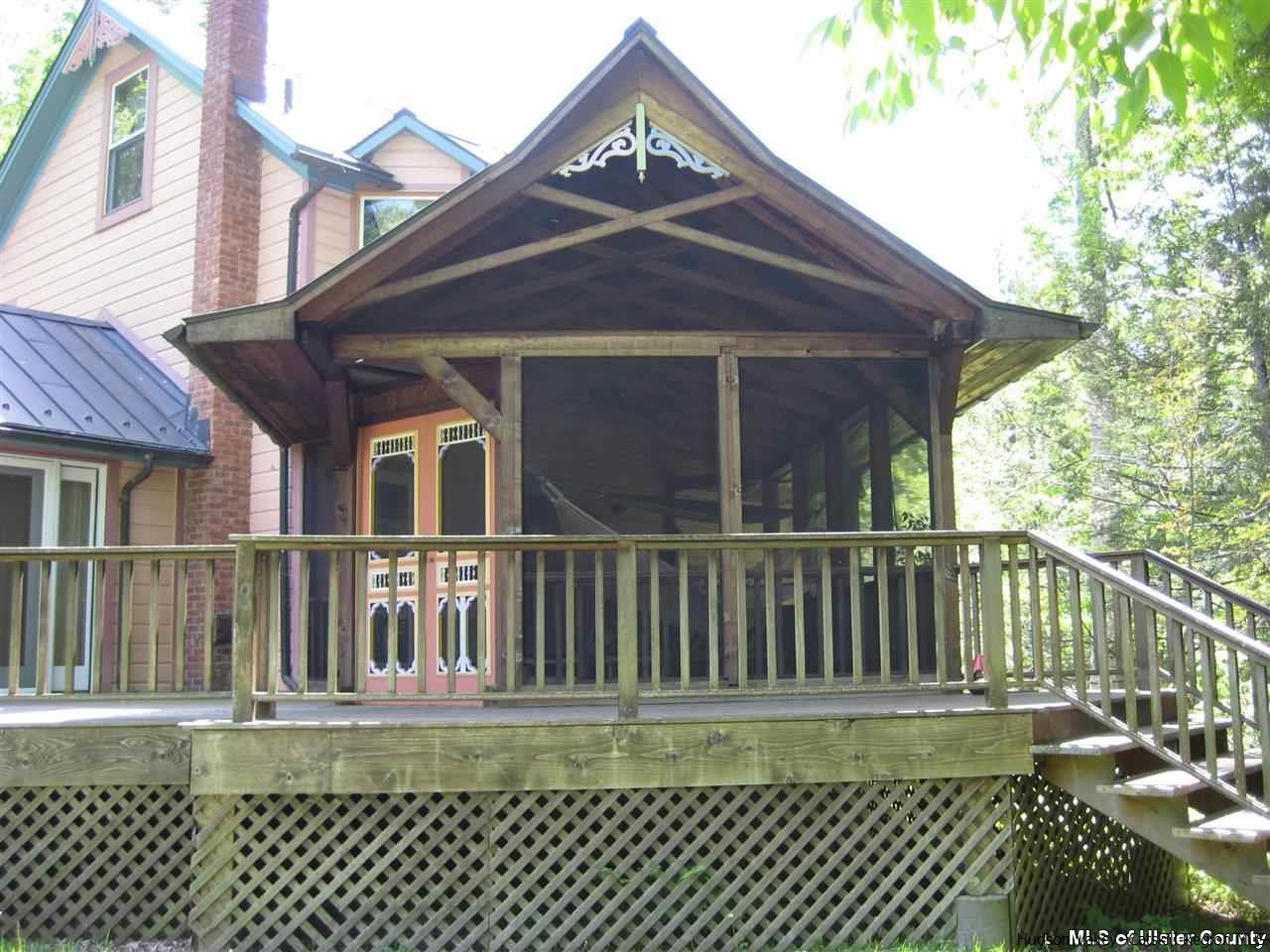 17 Cross Patch Road Woodstock, NY 12495 - Photo 30 of 35 a view of a brick house with a small yard