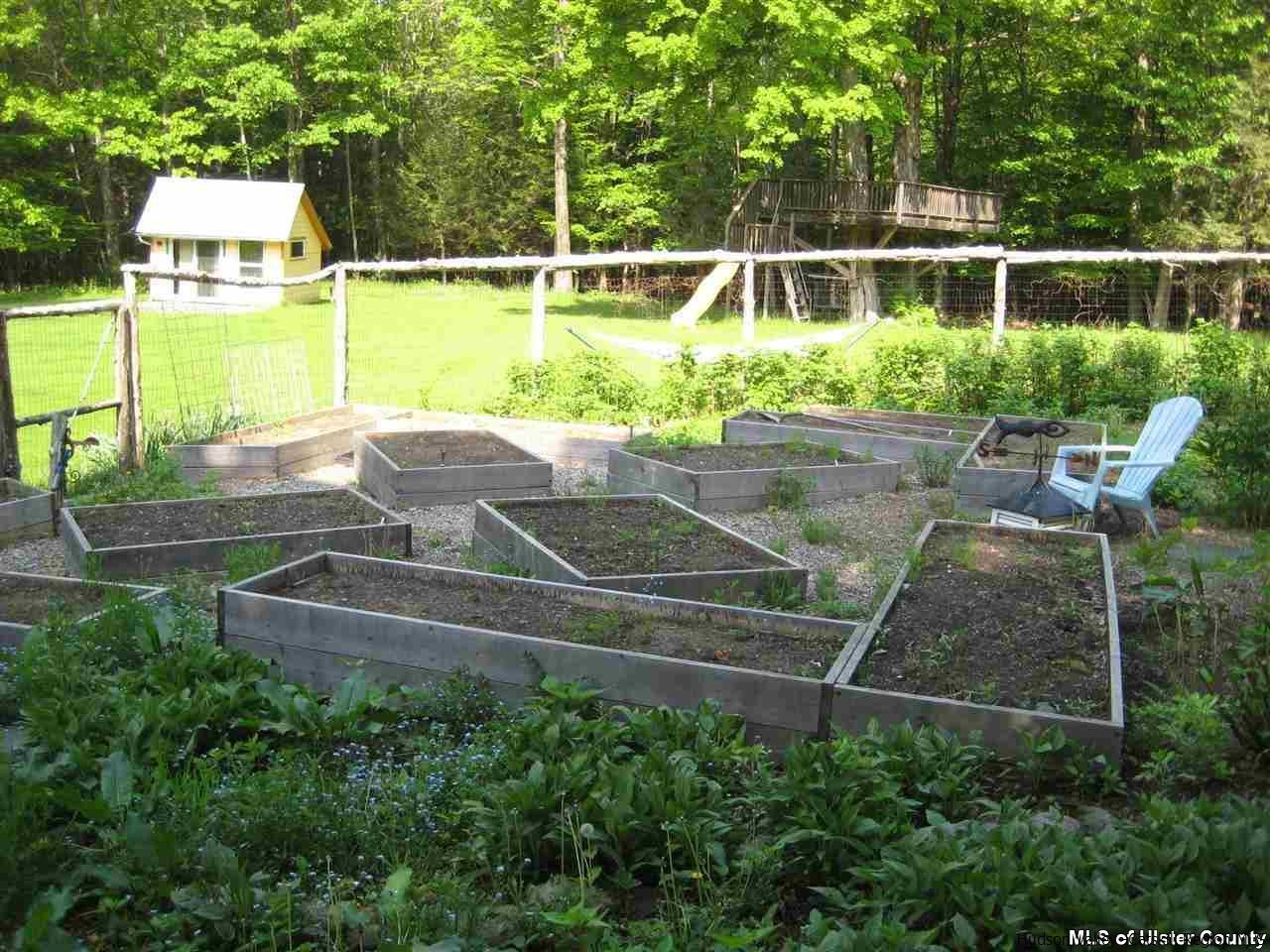 17 Cross Patch Road Woodstock, NY 12495 - Photo 33 of 35 a view of a house with backyard and sitting area