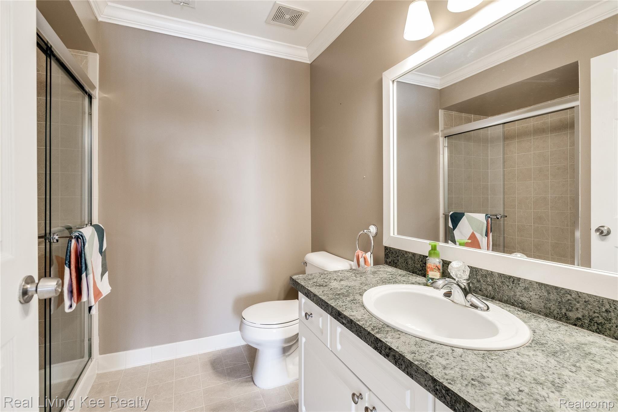 3601 Tremonte Circle Rochester, MI 48306 - Photo 29 of 44 Updated, clean master bathroom with sparkling shower doors.