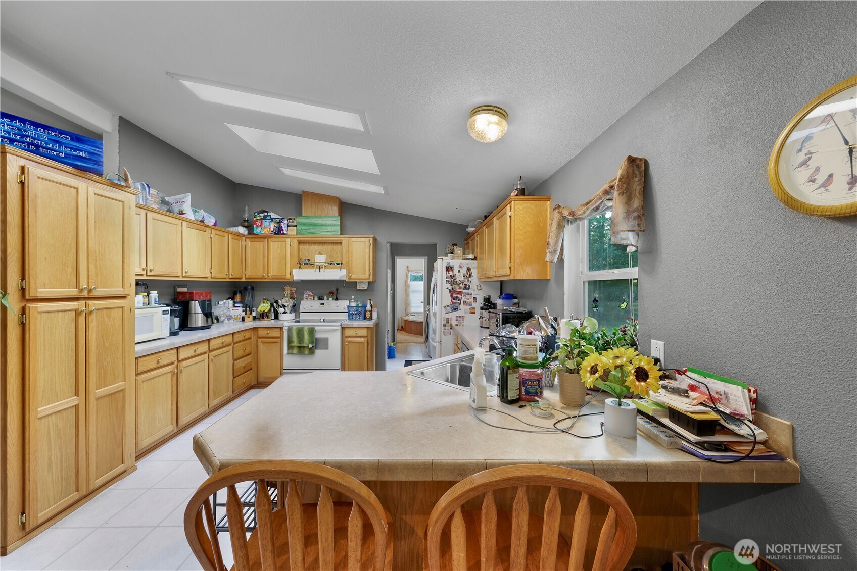 7928 Portal Way Custer, WA 98240 - Photo 17 of 39 a kitchen with a table and chairs